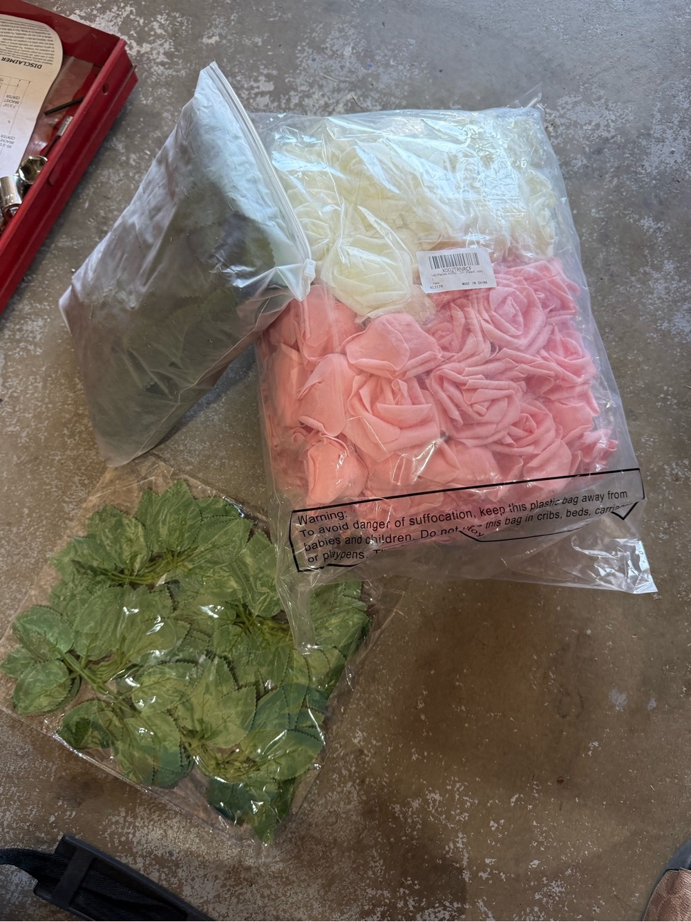 Bundle of peach and white Fabric Rose Appliqués with Green Leaves